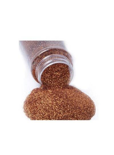 Orange glitter shakers for crafts in a clear bottle with sparkling glitter spilling out