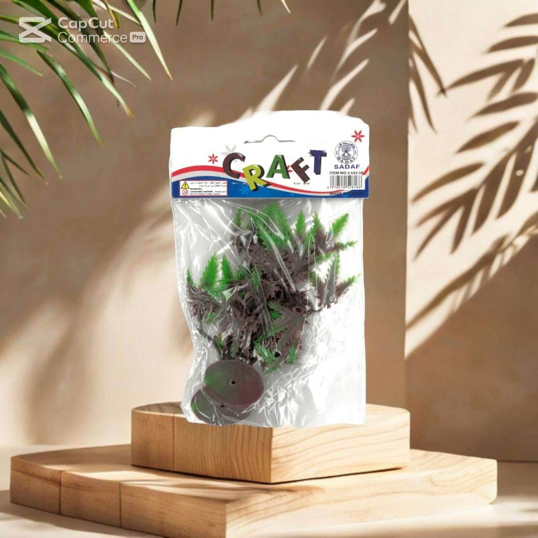 SADAF artificial plant craft set in a clear bag, perfect for DIY terrariums and creative projects, displayed on wooden blocks.