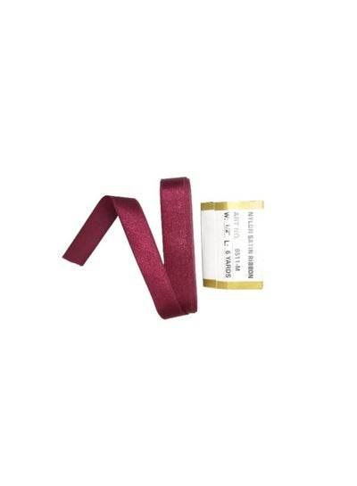 Maroon ribbon stationary supplies on display for crafting and gift wrapping projects